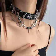 Black leather gothic choker worn at the neck